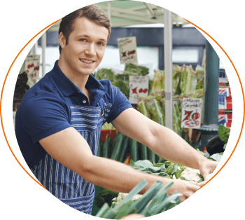 British greengrocer on market stall