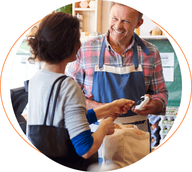 Shop worker helping customer